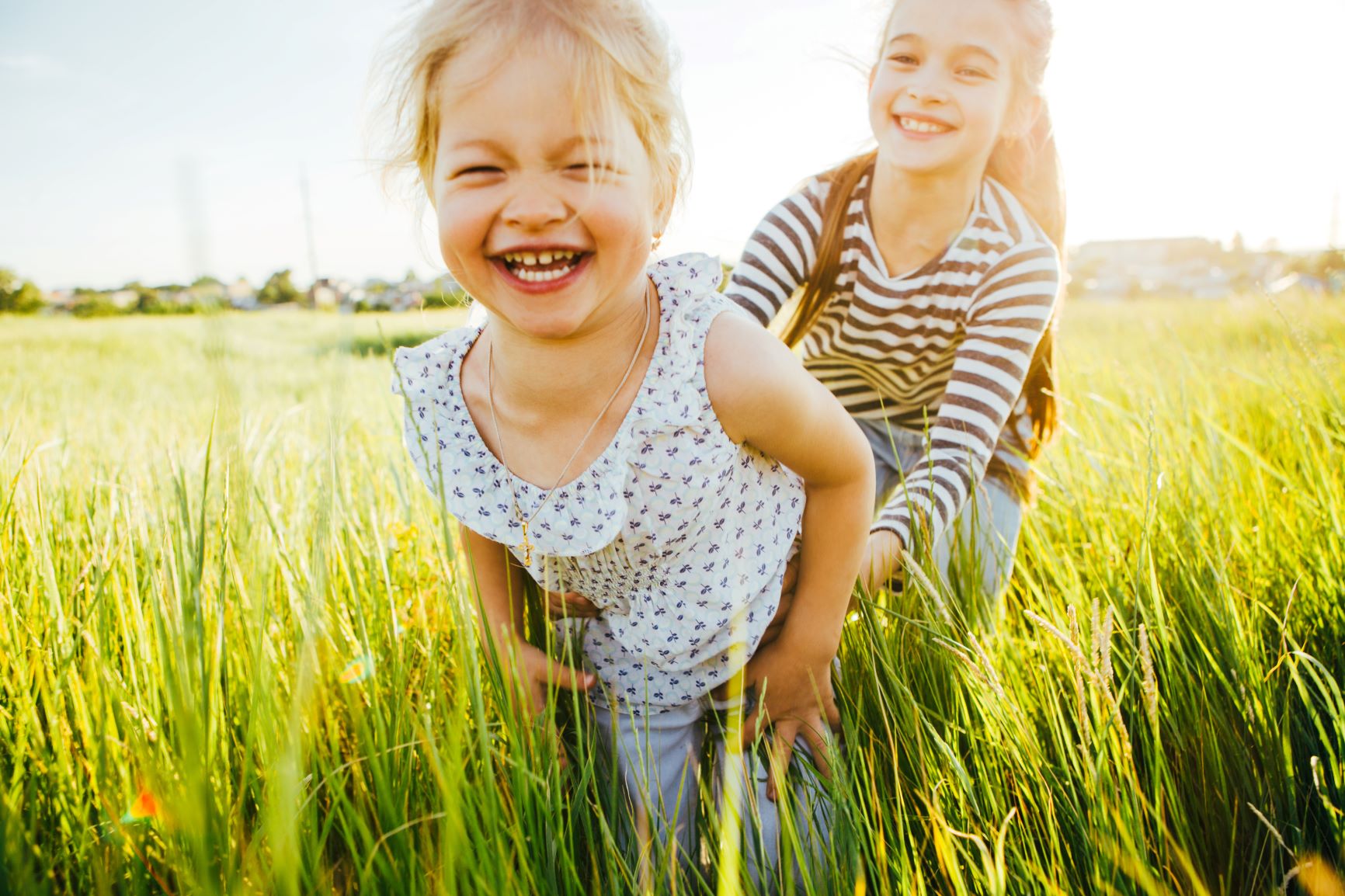 Children playing in field