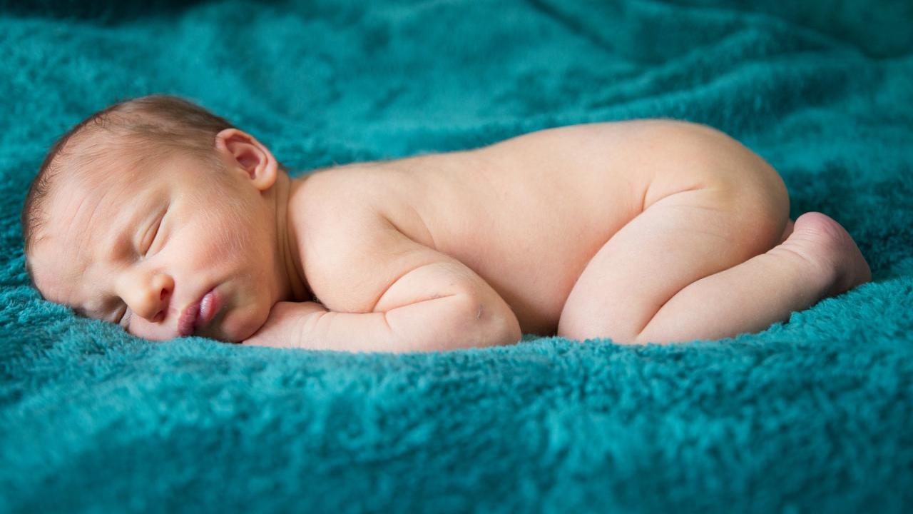 The B-SAFE study examines the effects smoke and ash had on pregnant women and their babies during the 2017 Northern California wildfires. Sleeping newborn